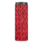 Hintergrund aus roter Strickwolle. Thermosbecher (Rückseite)