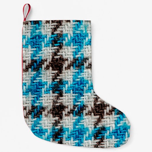 Hintergrund der Flanelltextur. Kleiner Weihnachtsstrumpf (Vorderseite)