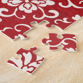 Hintergrund der roten chinesischen Spiralspirale. Puzzle (Seite)