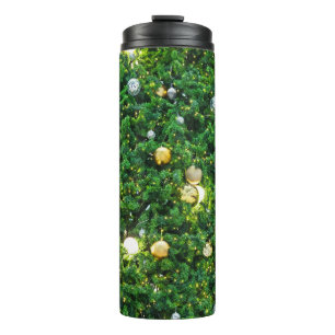Hintergrund der Weihnachtsbaumdekoration. Vintag G Thermosbecher