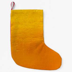 Hintergrund des grafischen Designs der goldenen Ta Kleiner Weihnachtsstrumpf