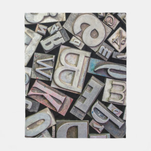Hintergrund von zufälliger Vintage-Grunge-Letterpr Fleecedecke