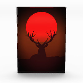 Hirsch-Silhouette mit feurigem rotem Sonnenunterga Fotoblock