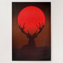 Hirsch-Silhouette mit feurigem roten Sonnenunterga