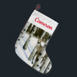 Hirsche im Schneefall Kleiner Weihnachtsstrumpf<br><div class="desc">Hirsche in Schneefall II von Grace Popp. Ein Reh versteckt sich unter Bäumen in einer friedlichen winterlichen Szene.</div>