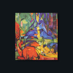 Hirsche im Wald II von Franz Marc, Vintage Kunst Leinwanddruck<br><div class="desc">Hirsche im Wald II (1914) von Franz Marc ist ein Vintager Expressionismus der schönen Kunst wilder Tiermalerei. Mehrere Waldtiere, Hirsche, ein Hirsch und ein Baby liegen in einem Wald, umgeben von Bäumen. Ein schöner, heller, farbenfroher Hintergrund. Über den Künstler: Franz Marc (1880-1916) war ein deutscher expressionistischer Maler, einer der Schlüsselfiguren...</div>