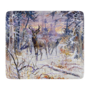 Hirsche in einem Schneewald (Wintersaison) Schneidebrett