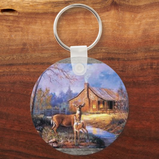 Hirsche und Hütte auf einem Schlüsselanhänger (Vorderseite)