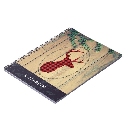 Hirschhaut mit Antlern auf Holzplanken mit Blätter Notizblock (Linke Seite)