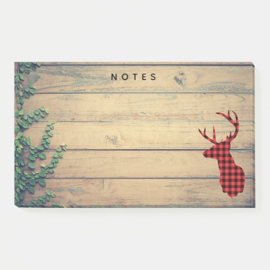 Hirschhaut mit Antlern auf Holzplanken mit Blätter Post-it Klebezettel (Vorderseite)