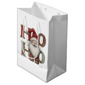 HO HO HO Santa Christmas Gift Bags Mittlere Geschenktüte (Vorderseite Schrägansicht)