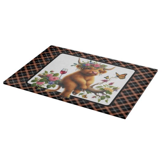 Hochlandkuh auf einer Zweigniederlassung Schneidebrett (Ecke)