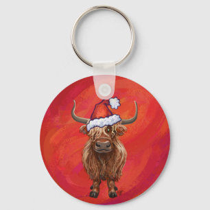 Hochlandkuh in Weihnachtsmannmütze auf Rot Schlüsselanhänger