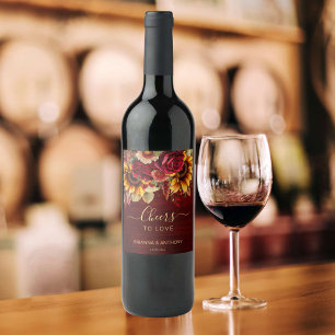 Hochzeit im Herbst Bordeaux Rose Sonnenblumen frön Weinetikett