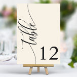 Hochzeit von Elfenbein und moderner Kalligrafie Tischnummer<br><div class="desc">Begleiten Sie Ihre Gäste mit diesen schicken, eleganten Elfenbein-Tischnummern zu ihren Sitzplätzen. Diese Tischnummern mit minimalistischem Design und moderner Kalligraphie fügen Ihrem Hochzeitsempfang eine Touch von Eleganz hinzu. Der weiche Hintergrund und die gepflegte, elegante Typografie sorgen für eine einfache Lesbarkeit bei gleichzeitig verstärkter Hochzeitsdekoration. Diese Tischnummern sind perfekt für jedes...</div>