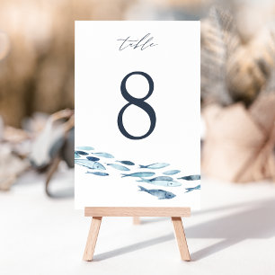 Hochzeitsfeier mit Blauer Wasserfarbe an der Küste Tischnummer