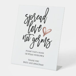 Hochzeitspread-Liebe nicht Keime nehmen eine Maske Sockelschild