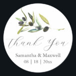 Hochzeitsticker Danke für die einfache Olive Branc Runder Aufkleber<br><div class="desc">Diese Hochzeitsaufkleber sind mit dem Set "Danke" in trendiger Schriftzeichen versehen. Verwenden Sie die Vorlagenfelder,  um Ihre individuelle Namen und das Hochzeitdatum hinzuzufügen. Ein Olivenzweig mit Single in Aquarellfarbe schmückt den Ober. Um das passende rustikale Hochzeitsgeschenk zu sehen,  besuchen Sie www.zazzle.com/dotellabelle Kunst und Design der Wasserfarbe von Victoria Grigaliunas</div>