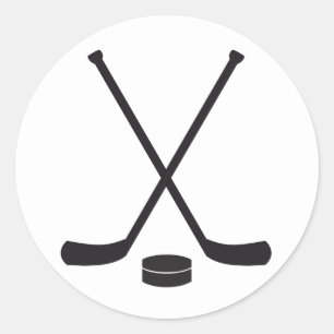 Hockey Sticks und Puck Runder Aufkleber