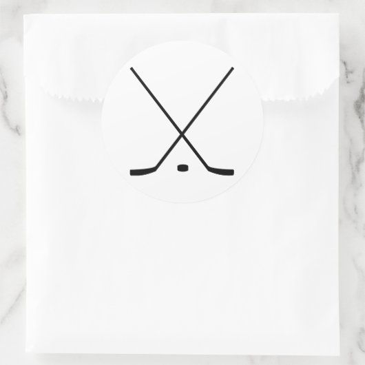 Hockeyschläger und -puck runder aufkleber (Tasche)