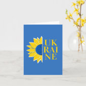 Hoffnung blüht inmitten der ukrainischen Kriegskar Karte (Gelbe Blume)