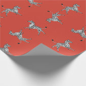 Hohe fünf Zebras im Rot Geschenkpapier (Ecke)