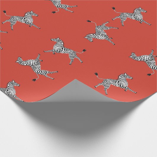 Hohe fünf Zebras im Rot Geschenkpapier (Ecke)
