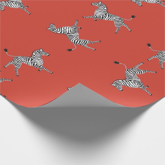 Hohe fünf Zebras im Rot Geschenkpapier (Ecke)