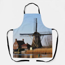 Hollandse Molen aan de waterkant. Schürze