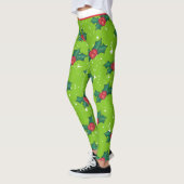 Holly Berries mit Schnee und Sternen auf Bright Gr Leggings (Links)