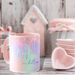Holographic unicorn glitter rainbow monogram tasse<br><div class="desc">A trendy holographic background with unicorn and rainbow pastel colors in pink, purple, rose gold, mint green. Decorated with faux glitter drips in rose gold, pink and purple. Personalize and add a name, written with a modern hand lettered style script with swashes. Purple colored letters. To keep the swashes only...</div>