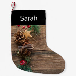 Holzboden mit Kiefernzapfen Kleiner Weihnachtsstrumpf
