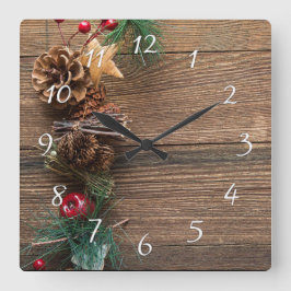 Holzboden mit Kiefernzapfen Quadratische Wanduhr