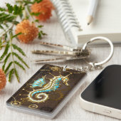 Holzboden mit mechanischem Seepferd Schlüsselanhänger (Vorderseite rechts)