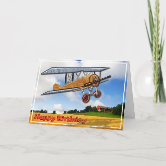 Hölzerner Doppeldecker über Feld-alles Gute zum Karte (Vorderseite)