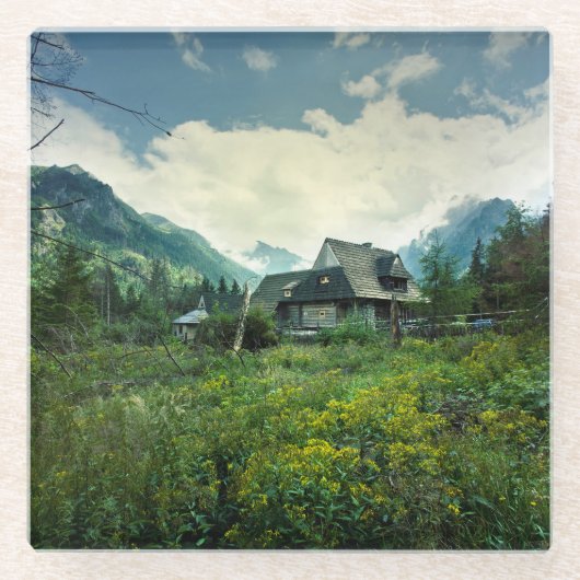 Holzhaus, Berglandschaft. Glasuntersetzer (Vorderseite)
