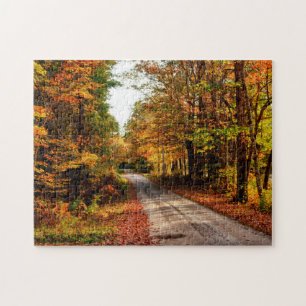 Holzpfad mit Herbstlaub Puzzle