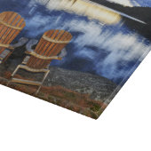 Holzstühle bei Sonnenuntergang am See Schneidebrett (Ecke)