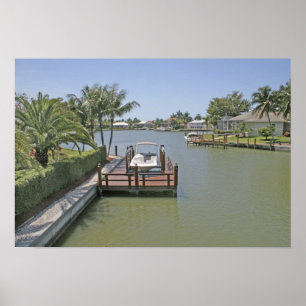 Homes and docks on canal Marco Island Florida Poster