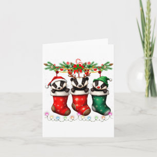 Honig-Dachs in Weihnachts-Socken leuchtet Honig-Ab Karte