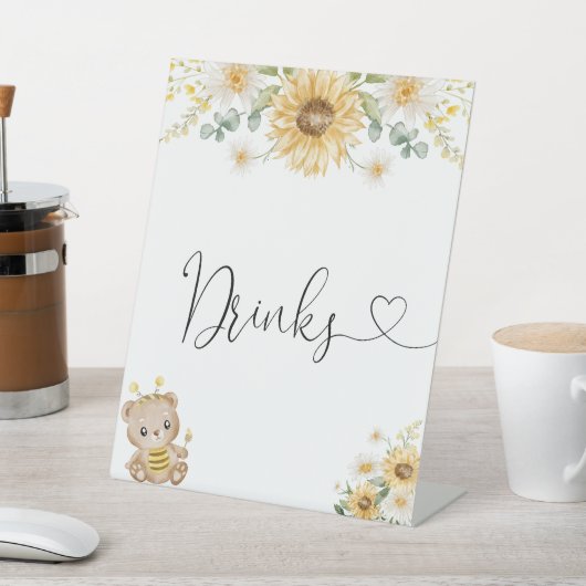 Honigbär mit Sonnenblumengetränken Sockelschild (In SItu)