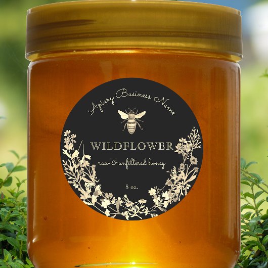 Honigbiene aus Gold und schwarzer Wildblume Runder Aufkleber