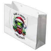 Hoppe Weihnachten | Froschpuppe Große Geschenktüte (Vorderseite Schrägansicht)