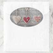 Hört über einem Holztisch Ovaler Aufkleber (Tasche)