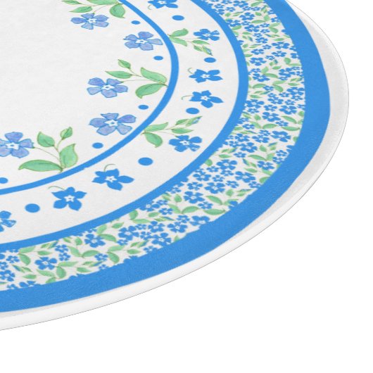 Hübsche blaugrüne Periwinkles, florale, rund um di Schneidebrett (Ecke)