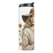 HÜBSCHE BLONDE-FRAU MIT HERBSTLAUBEN THERMOSBECHER (Nach links gedreht)