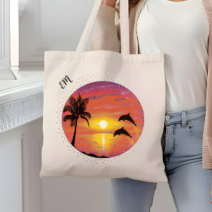 Hübsche Delphine spielen bei den Sonnenuntergang Tragetasche