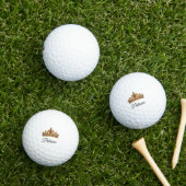 Hübsche goldene Krone und benutzerdefinierter Name Golfball (Insitu Gras)