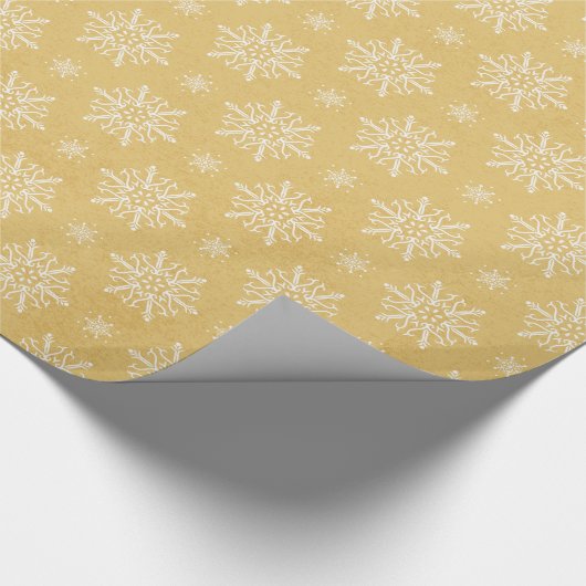 Hübsche goldgelbe Weihnachtsschneeflocke Geschenkpapier (Ecke)