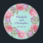 Hübsche Hochzeit mit Blumenwasser Magnet<br><div class="desc">Ein hübscher Hochzeitssake / Gedenk oder speichern Sie den Datums-Magneten. Eine wunderschöne botanische Themenabbildung mit einem kreisförmigen Kranz hübscher Aquarellfarben-Blume in Rosa und lila mit grünen Blätter dazwischen. Das Blumendesign besteht aus rosafarbenen Pfannkuchen und lila Anemonen. Der Hintergrund ist eine weiche, minzgrüne Aquarelltextur. Personalisieren Sie mit Ihren Namen und Hochzeitstermin....</div>